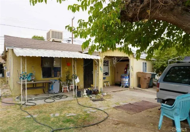 a car parked in front of a house