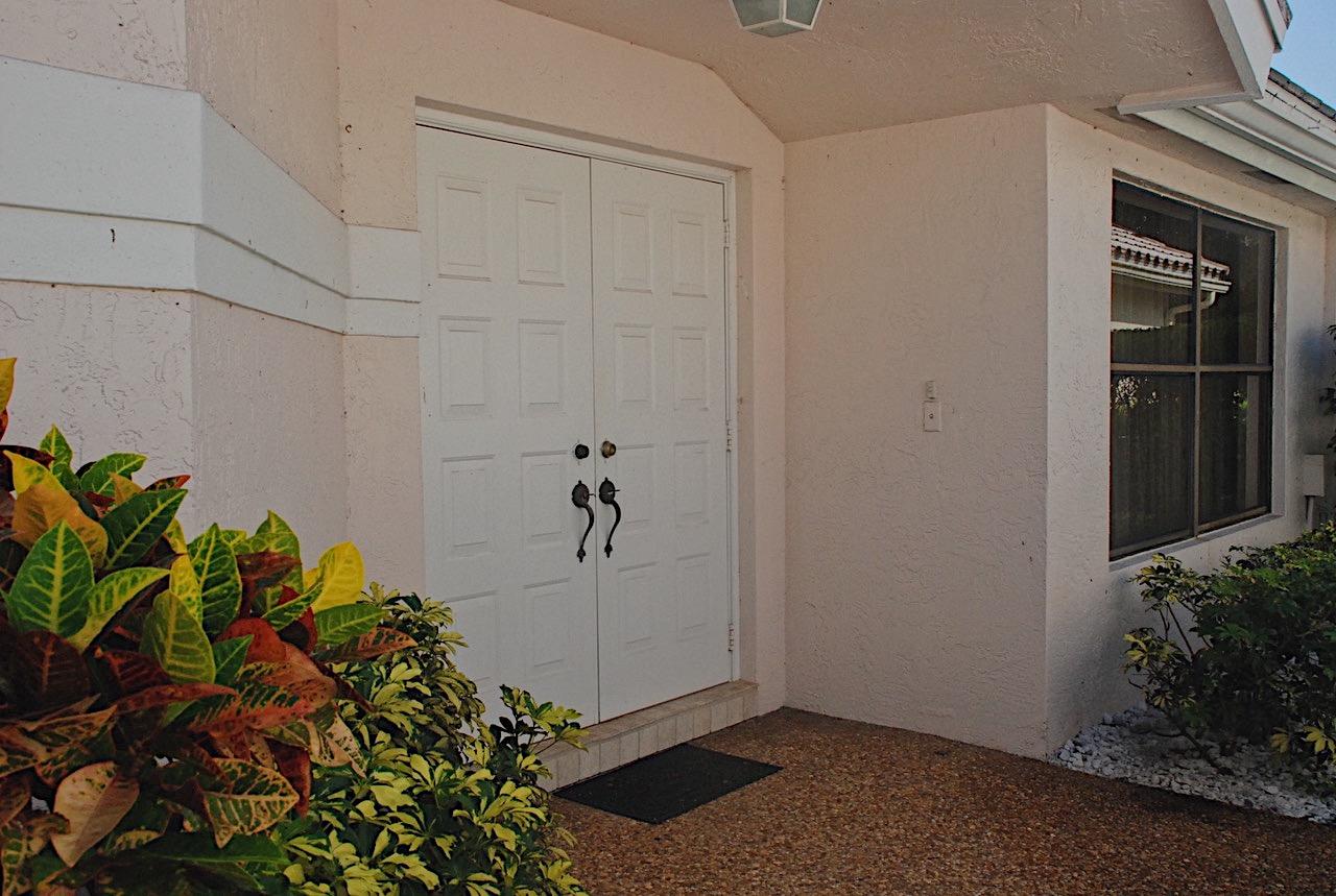 11271 Cloverleaf Circle Boca Raton, FL 33428 - Photo 3 of 23 front door