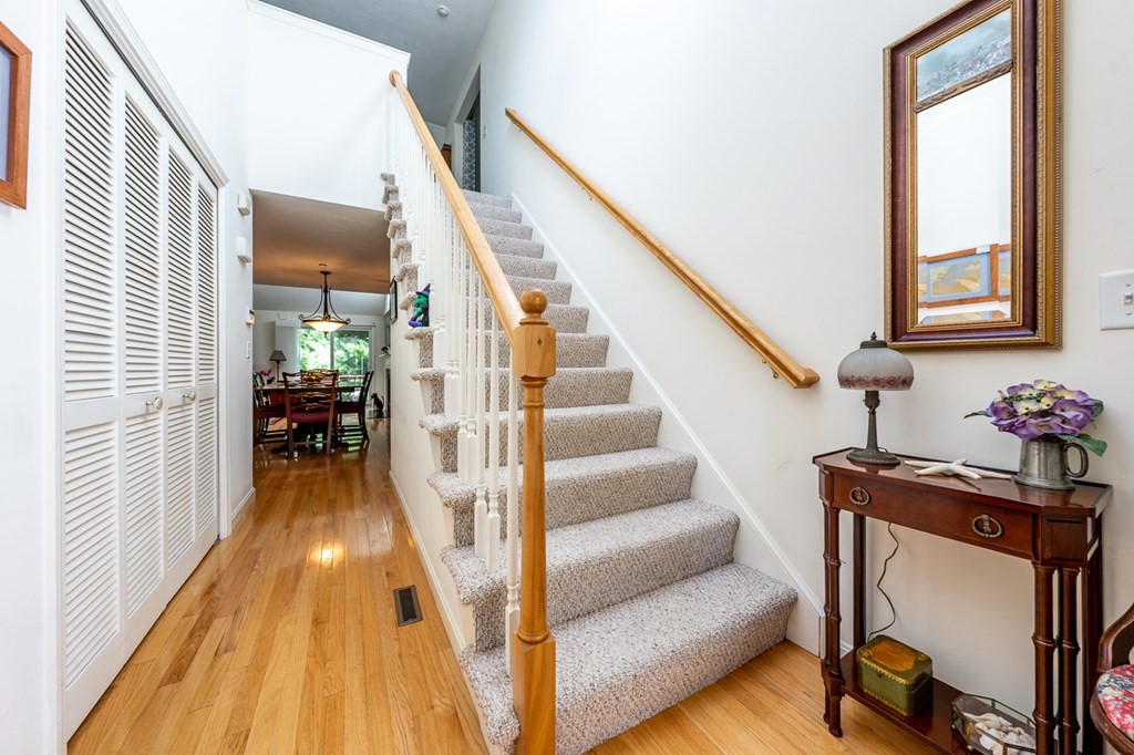 17 North Ridge Road, Unit 444 Mashpee, MA 02649 - Photo 11 of 18 a view of entryway and hall with wooden floor