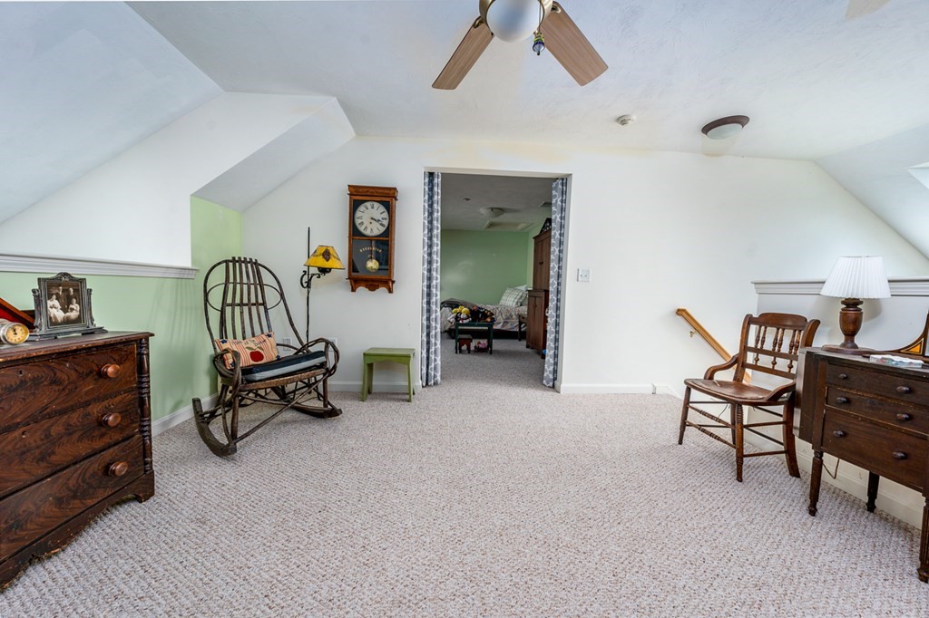 17 North Ridge Road, Unit 444 Mashpee, MA 02649 - Photo 12 of 18 a bedroom with furniture and a bed