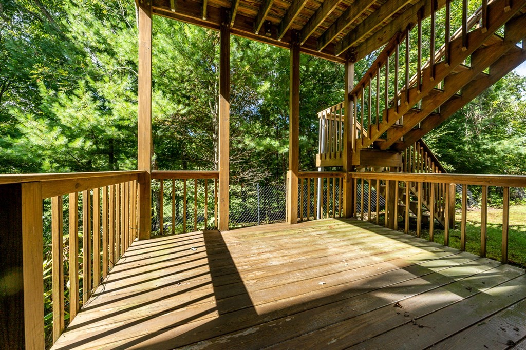 17 North Ridge Road, Unit 444 Mashpee, MA 02649 - Photo 17 of 18 a view of a wooden deck