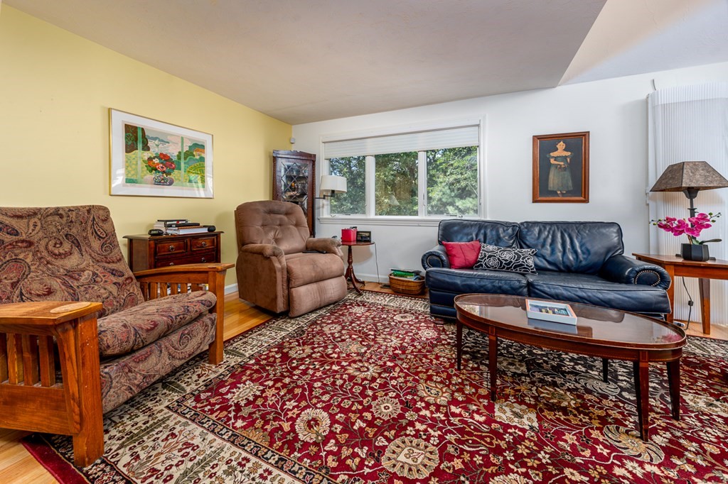 17 North Ridge Road, Unit 444 Mashpee, MA 02649 - Photo 5 of 18 a living room with furniture and a window