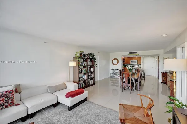 a view of a livingroom with furniture and toys