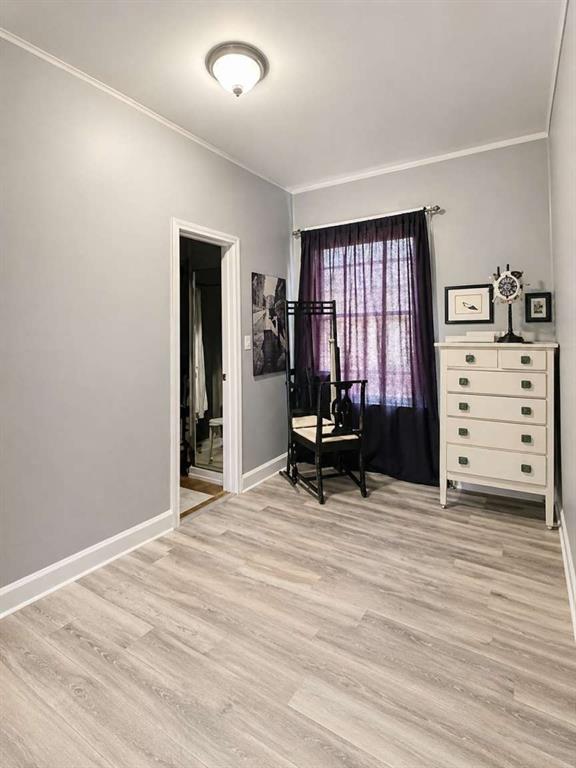 2405 Meriwether Road Shreveport, LA 71108 - Photo 13 of 20 a view of a bedroom with furniture and a window