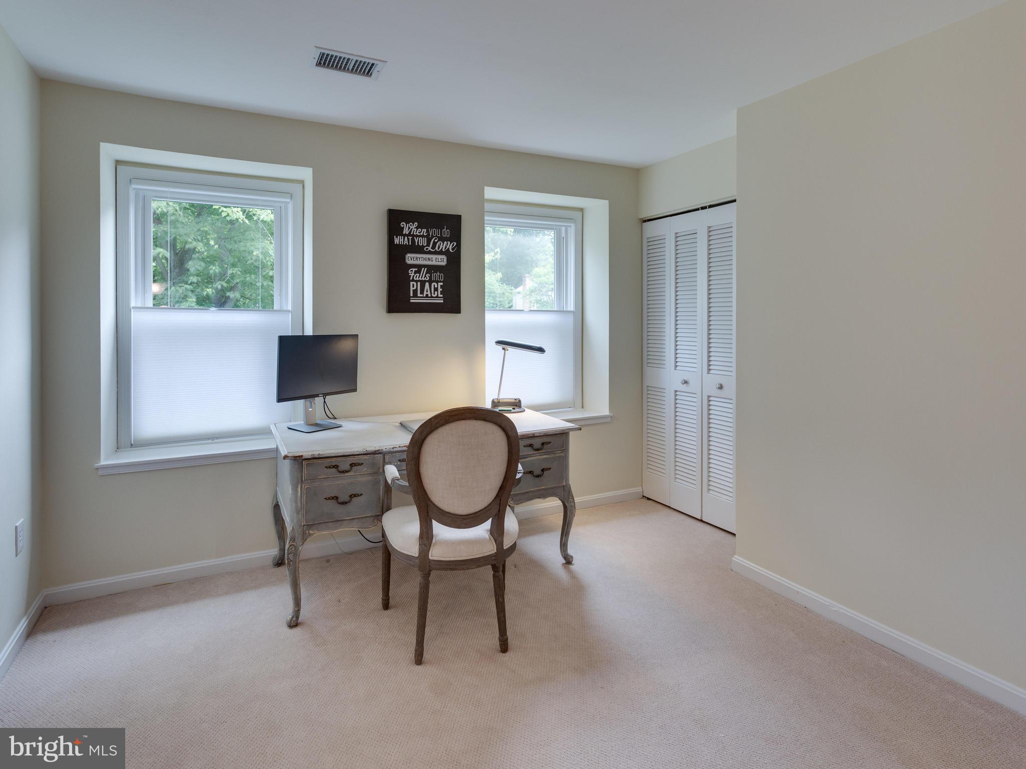 9031 Edgepark Road Vienna, VA 22182 - Photo 18 of 30 a workspace with furniture window and wooden floor