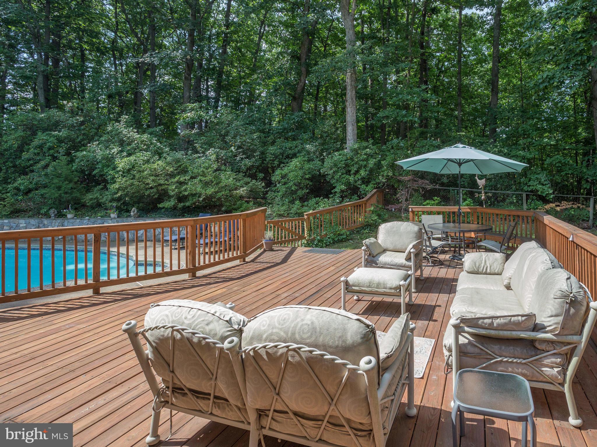 9031 Edgepark Road Vienna, VA 22182 - Photo 3 of 30 a view of a patio with furniture