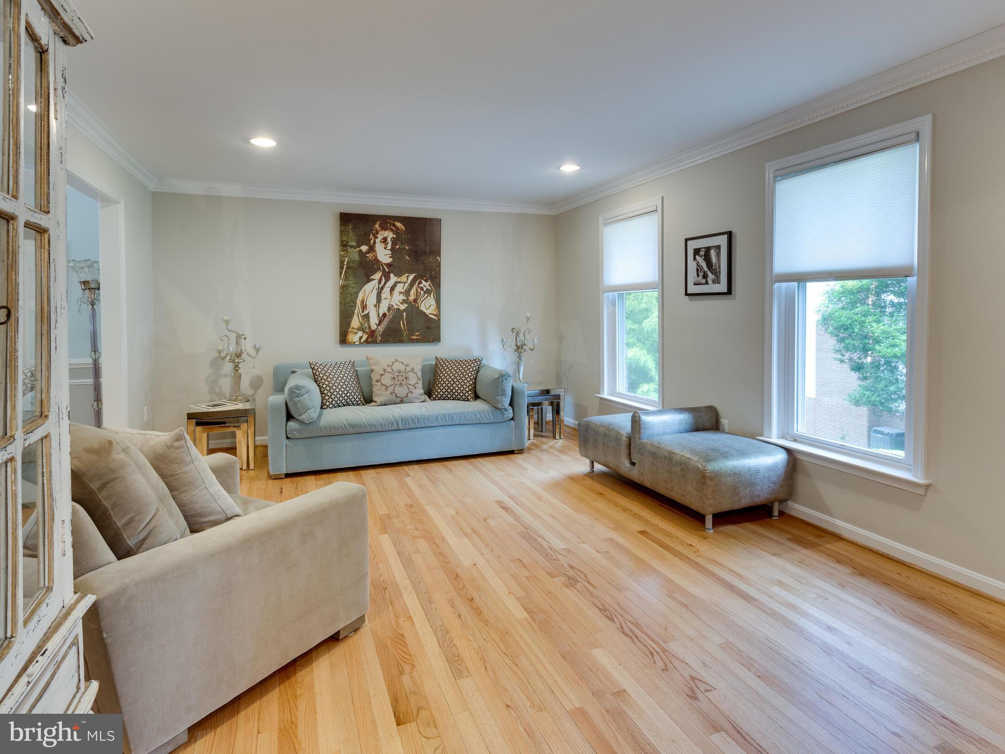 9031 Edgepark Road Vienna, VA 22182 - Photo 7 of 30 a living room with furniture and a window