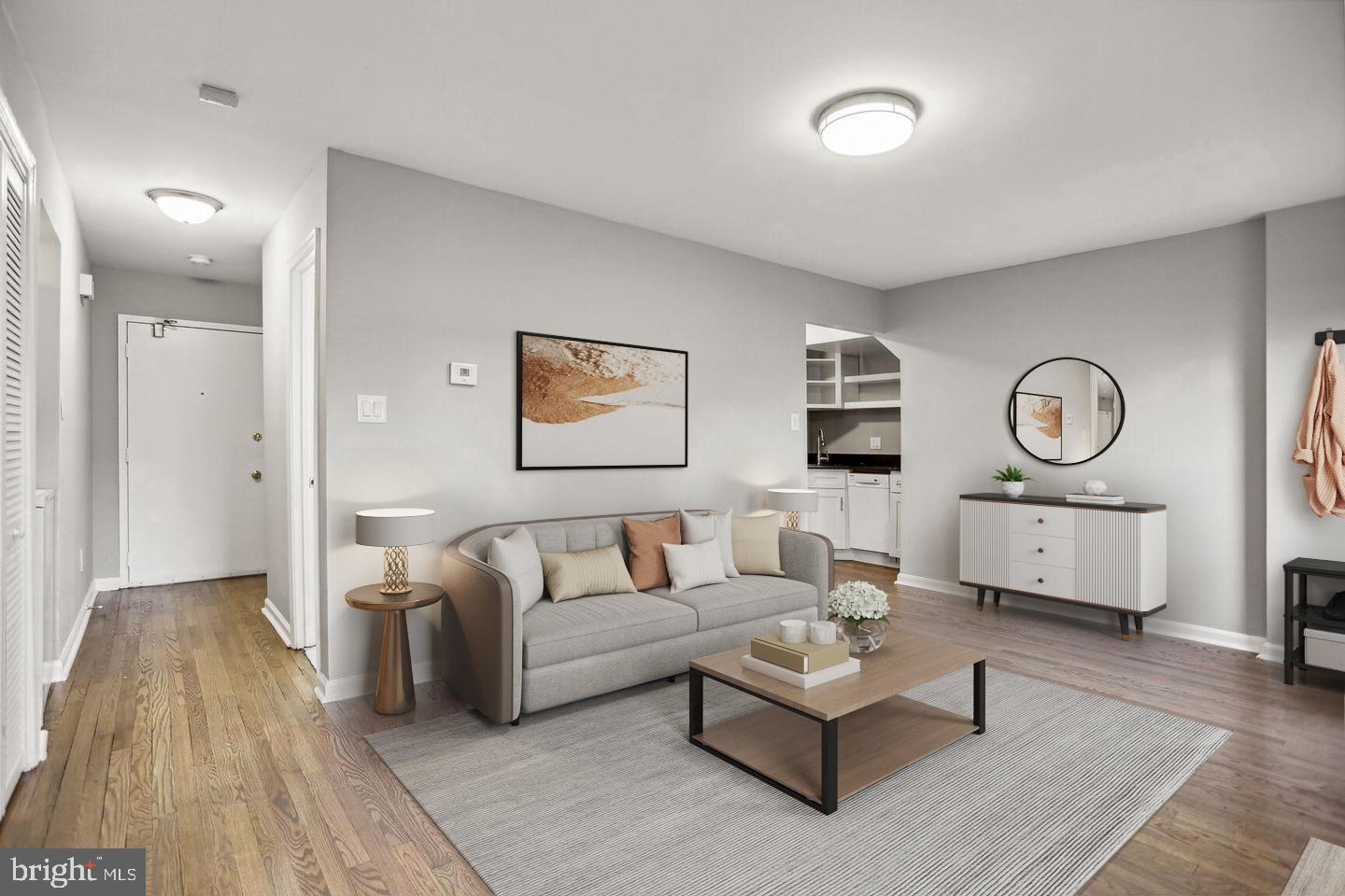 1507 Freedom Way Southeast, Unit 1 Washington, DC 20003 - Photo 1 of 15 a living room with furniture and a wooden floor