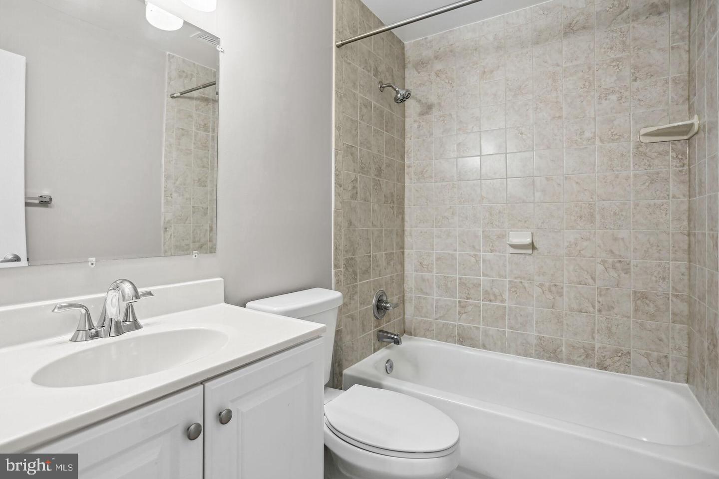 1507 Freedom Way Southeast, Unit 1 Washington, DC 20003 - Photo 11 of 15 a bathroom with a sink toilet and shower