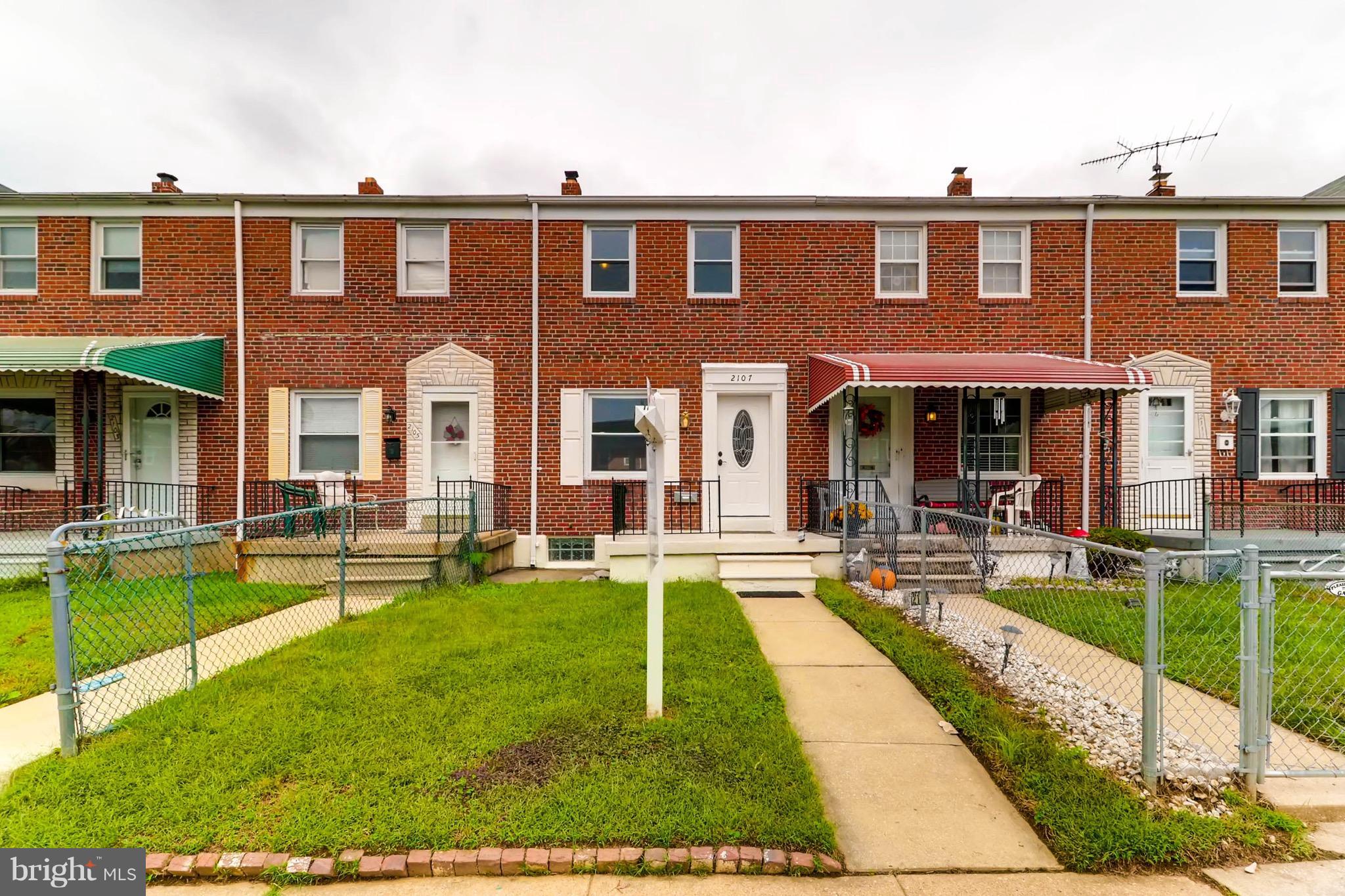 2107 Redthorn Road Baltimore, MD 21220 - Photo 1 of 14 a front view of a house with swimming pool having outdoor seating