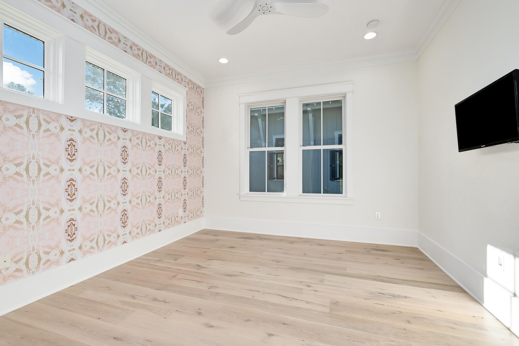 127 Blackwater Street Santa Rosa Beach, FL 32459 - Photo 51 of 97 a view of an empty room with wooden floor and a window