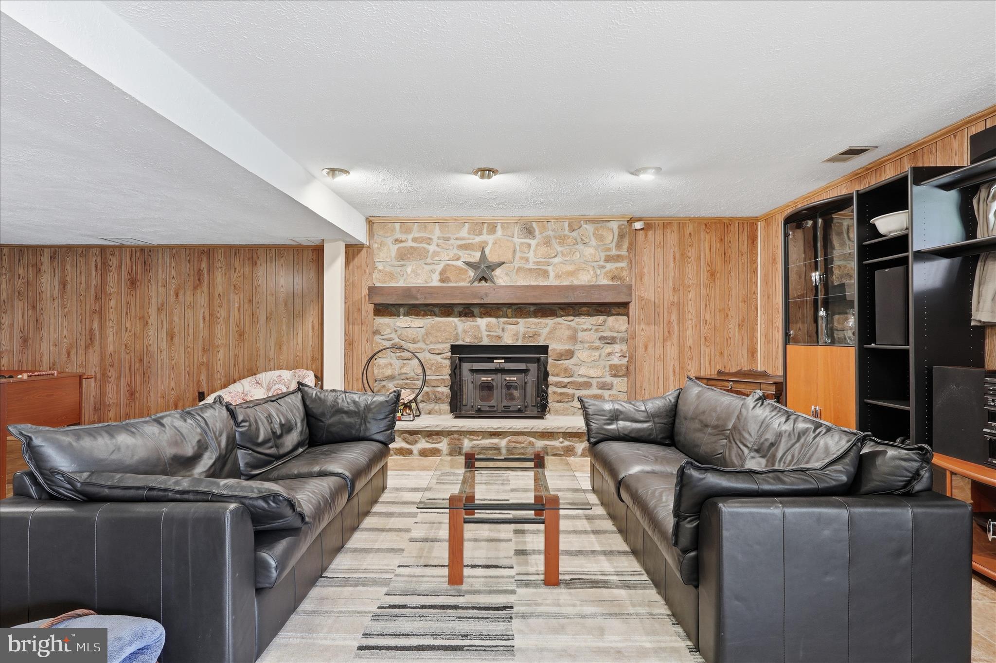 5605 Smoke Rise Lane Fairfax Station, VA 22039 - Photo 45 of 85 a living room with furniture and a fireplace