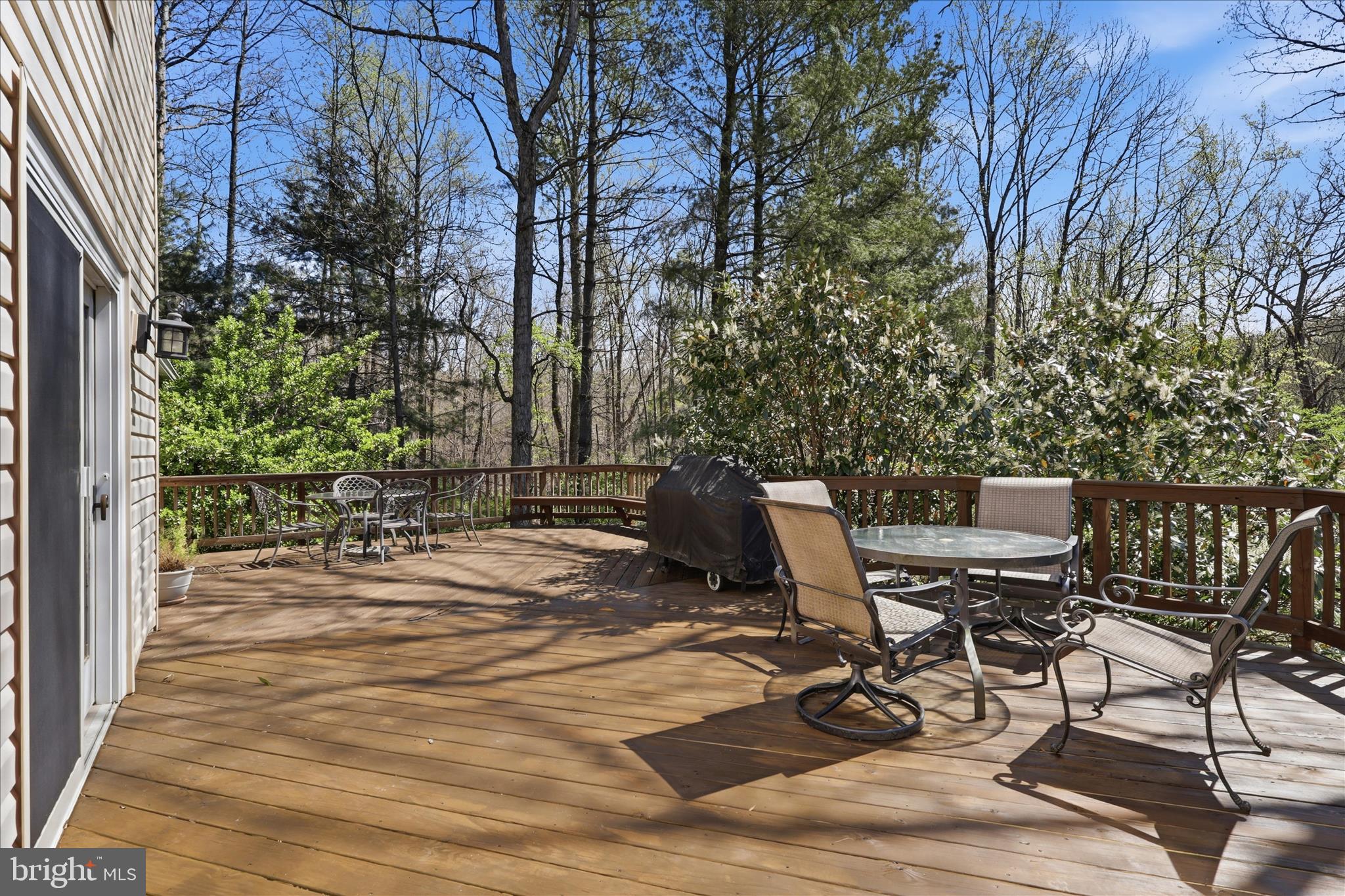 5605 Smoke Rise Lane Fairfax Station, VA 22039 - Photo 52 of 85 a view of a chairs and tables in the patio