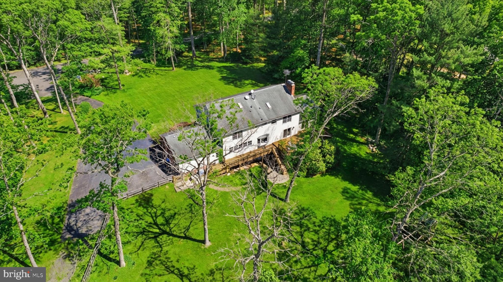 5605 Smoke Rise Lane Fairfax Station, VA 22039 - Photo 73 of 85 a view of garden with plants and trees