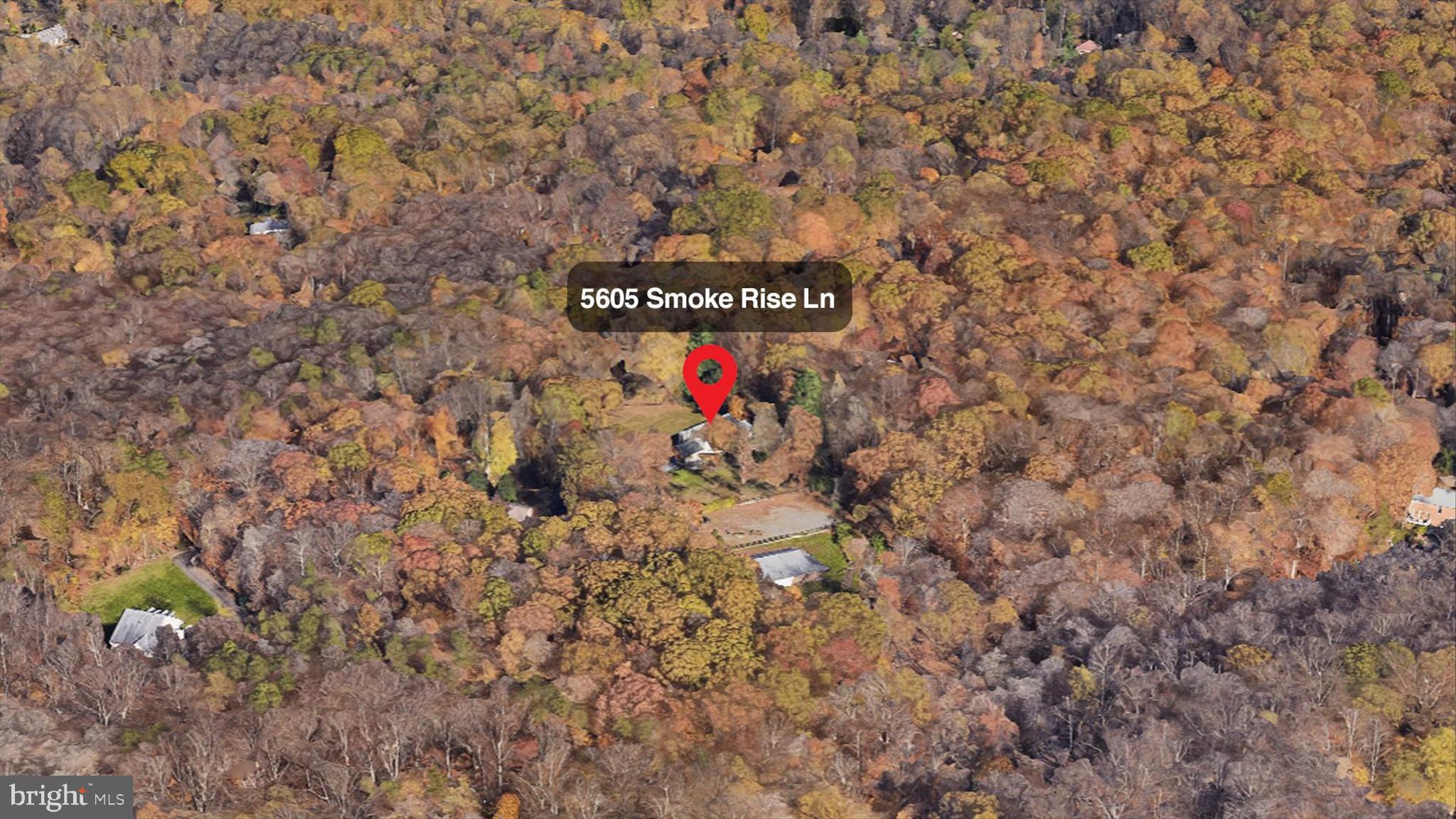 5605 Smoke Rise Lane Fairfax Station, VA 22039 - Photo 80 of 85 a sign that is sitting in front of a building