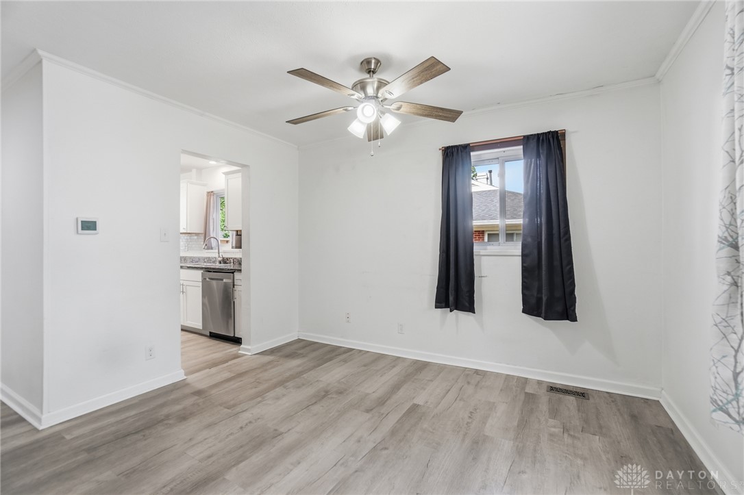 629 Storms Road Dayton, OH 45429 - Photo 19 of 51 Bright, open-concept living space features durable flooring and convenient access to the kitchen.