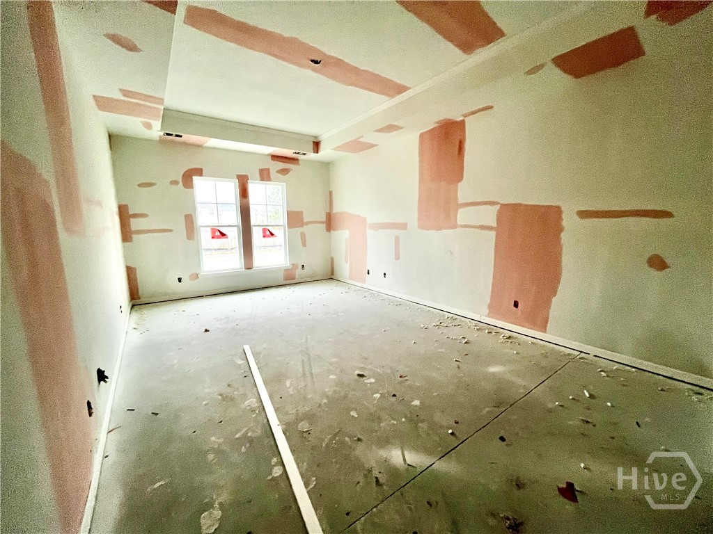 103 Snowbell Court Savannah, GA 31419 - Photo 16 of 24 Large primary bedroom with tray ceiling.
Photo taken 1.31.26. HOME IS UNDER CONSTRUCTION.
