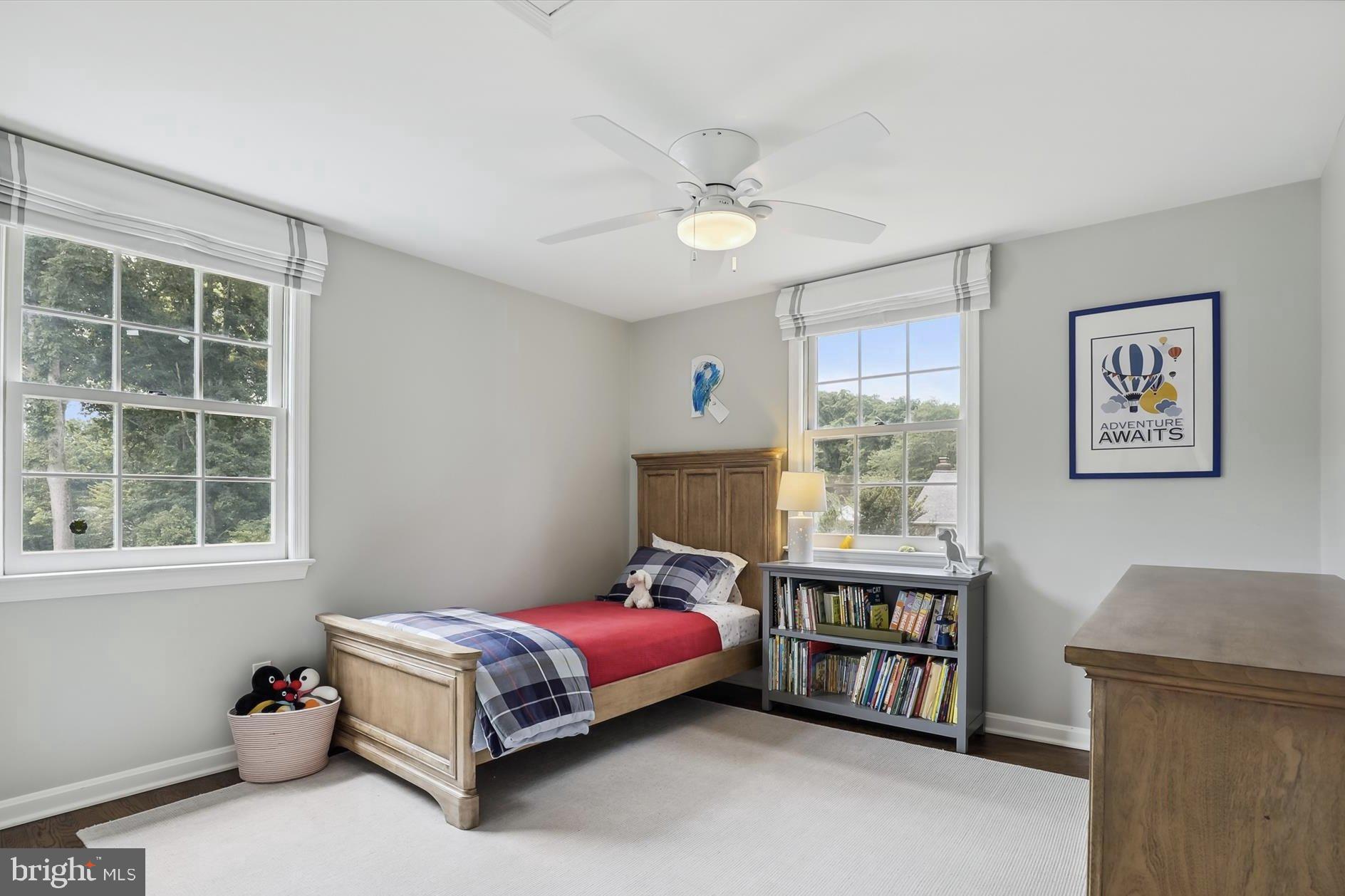 11310 Rolling House Road North Bethesda, MD 20852 - Photo 13 of 26 a bedroom with a bed and a window