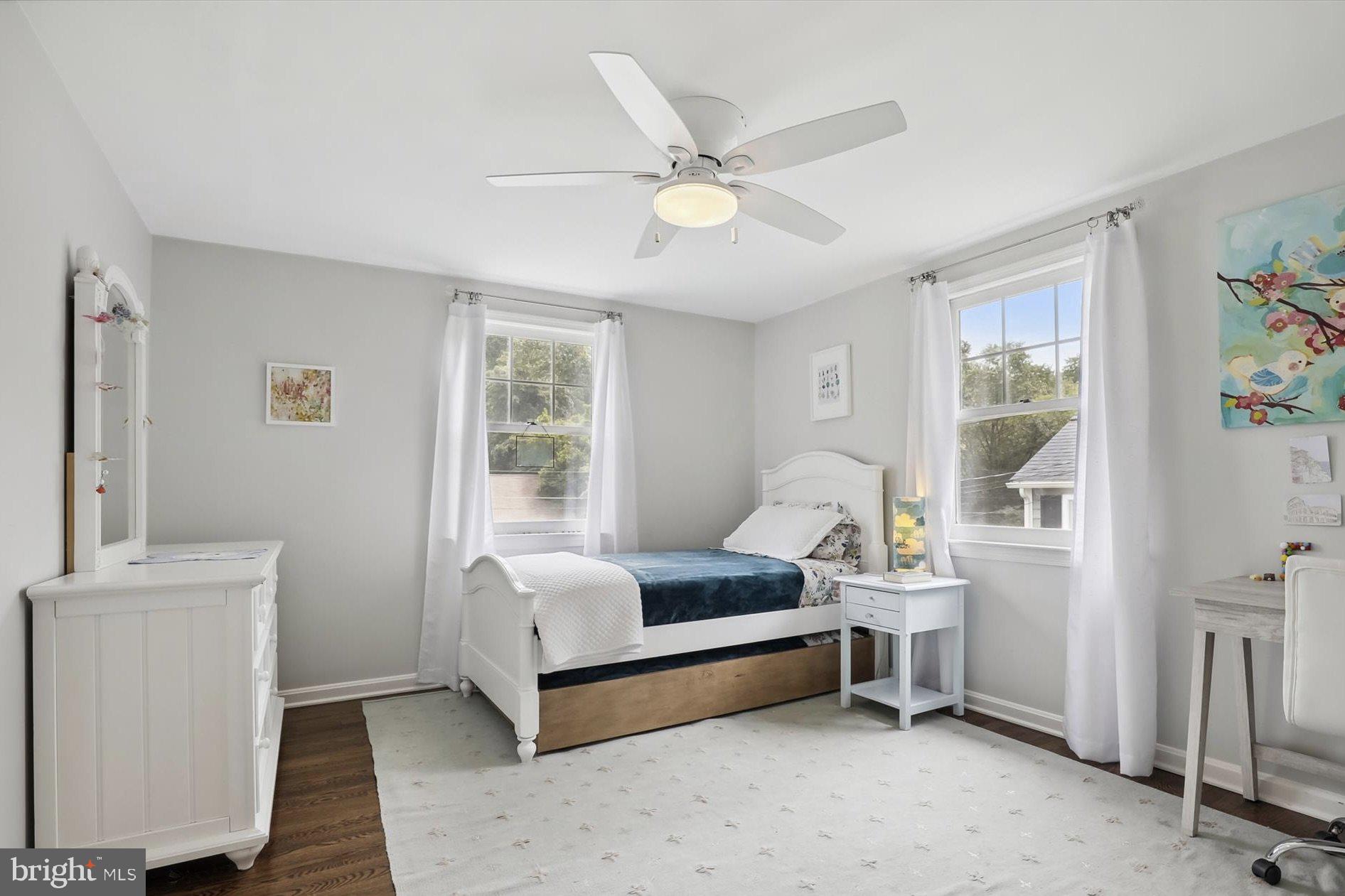 11310 Rolling House Road North Bethesda, MD 20852 - Photo 16 of 26 a bedroom with a bed and a window