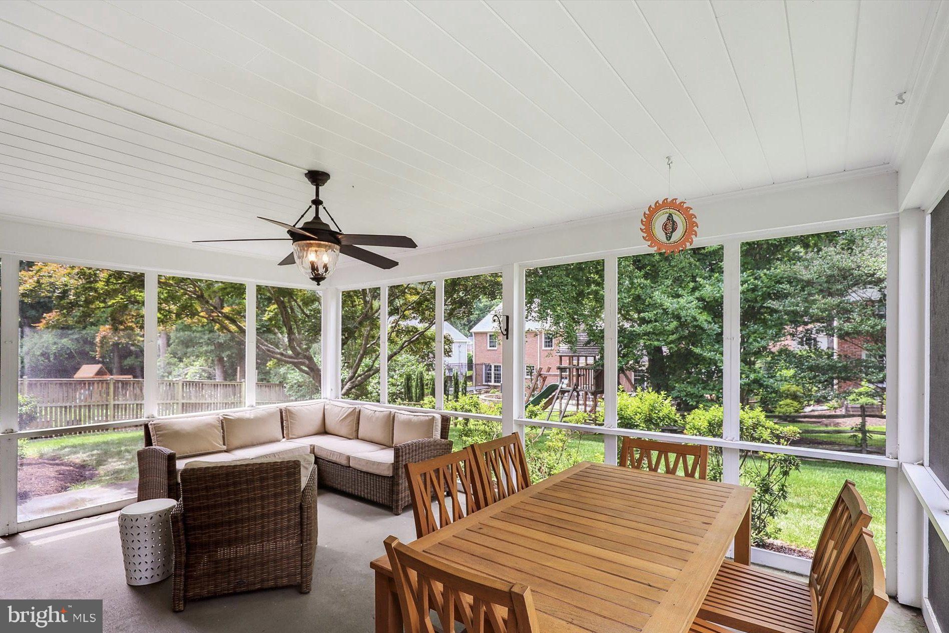 11310 Rolling House Road North Bethesda, MD 20852 - Photo 9 of 26 a living room with furniture and a large window