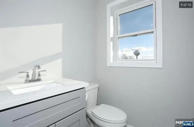 a bathroom with a bathtub and a sink