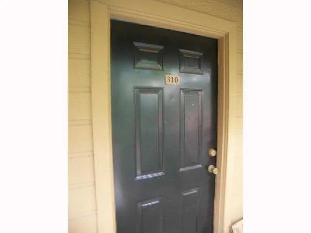 a bathroom with a mirror