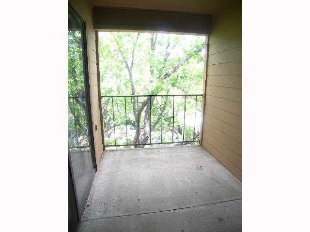 203 East 31st Street, Unit 310 Austin, TX 78705 - Photo 9 of 12 a view of an empty room with a window