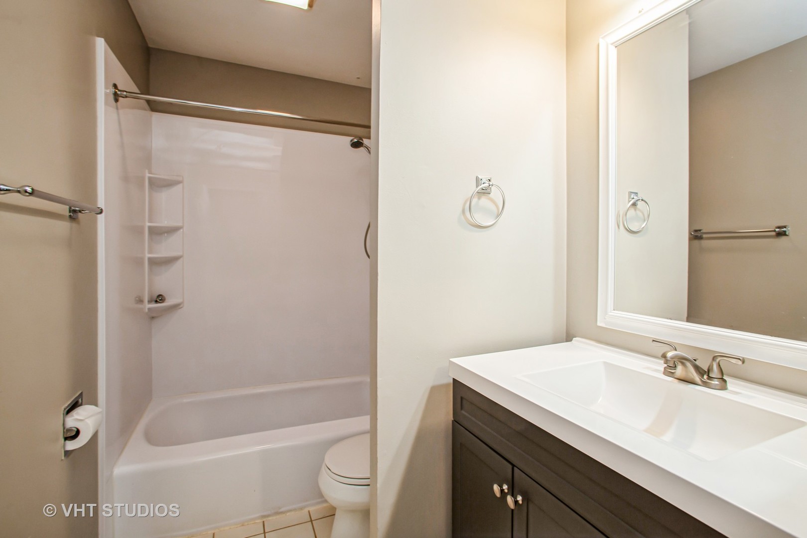 1660 Darwin Court Wheaton, IL 60189 - Photo 12 of 17 a bathroom with a granite countertop sink toilet and shower
