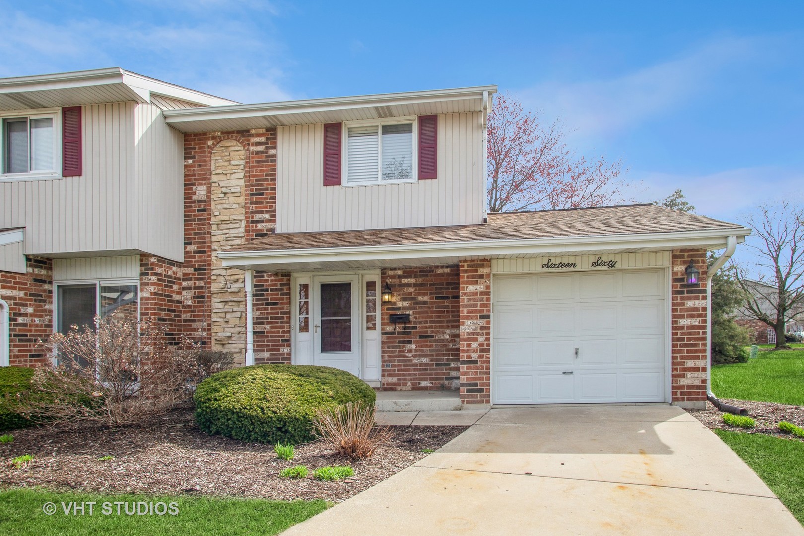 1660 Darwin Court Wheaton, IL 60189 - Photo 2 of 17 front view of a house and a yard