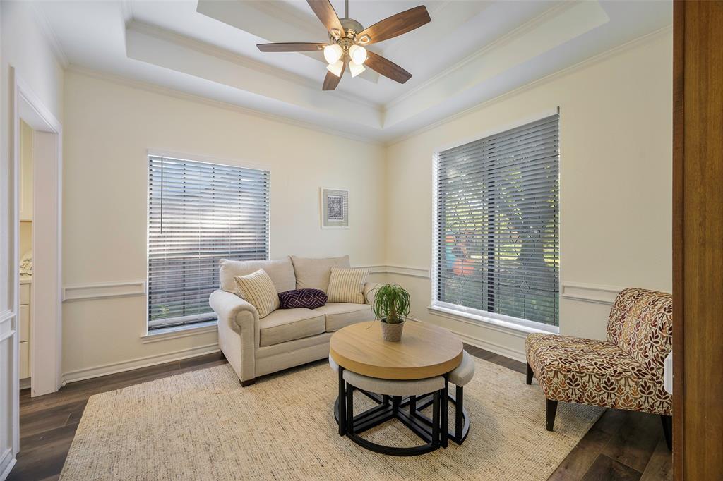 925 Spring Brook Drive Allen, TX 75002 - Photo 2 of 26 a living room with furniture and a large window