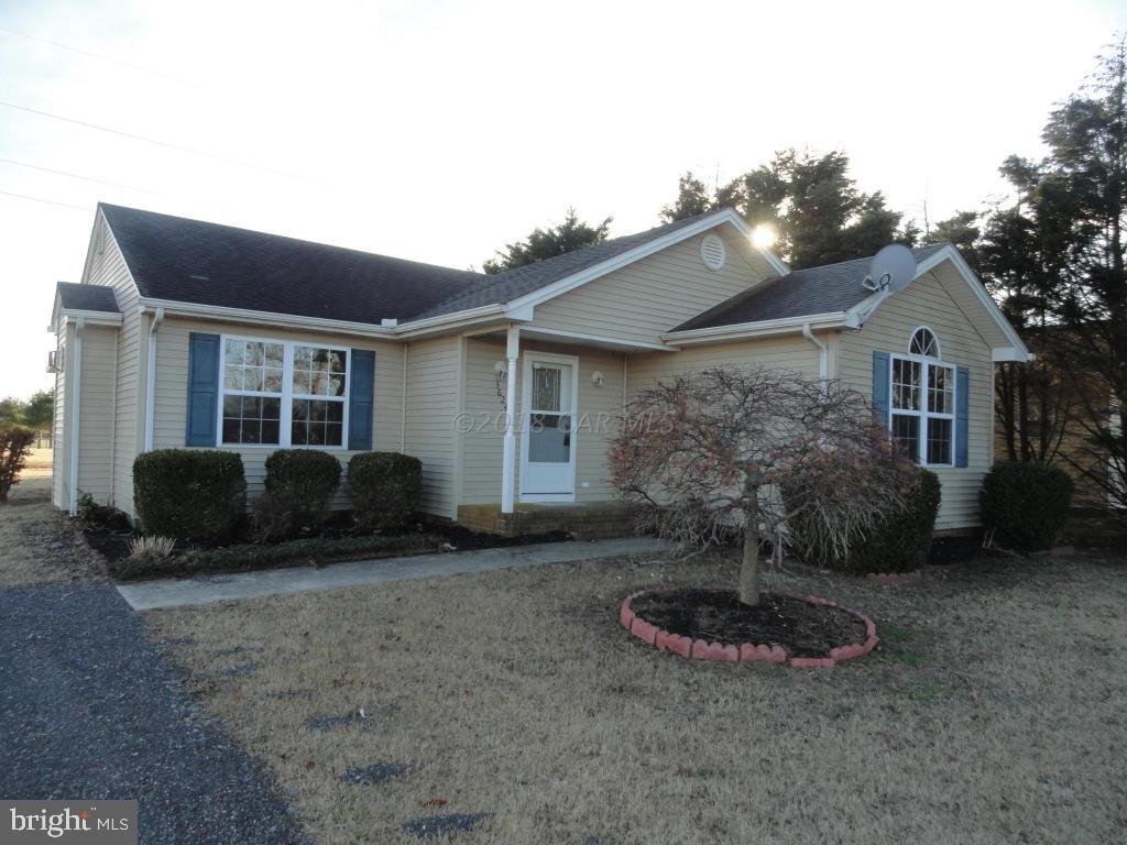 36245 Richland Road Willards, MD 21874 - Photo 14 of 14 a view of a house with backyard and porch
