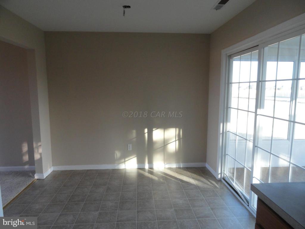 36245 Richland Road Willards, MD 21874 - Photo 6 of 14 a view of empty room with windows
