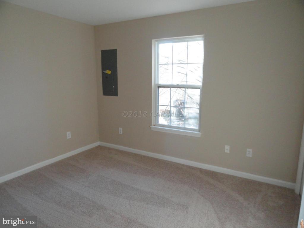 36245 Richland Road Willards, MD 21874 - Photo 7 of 14 an empty room with a window