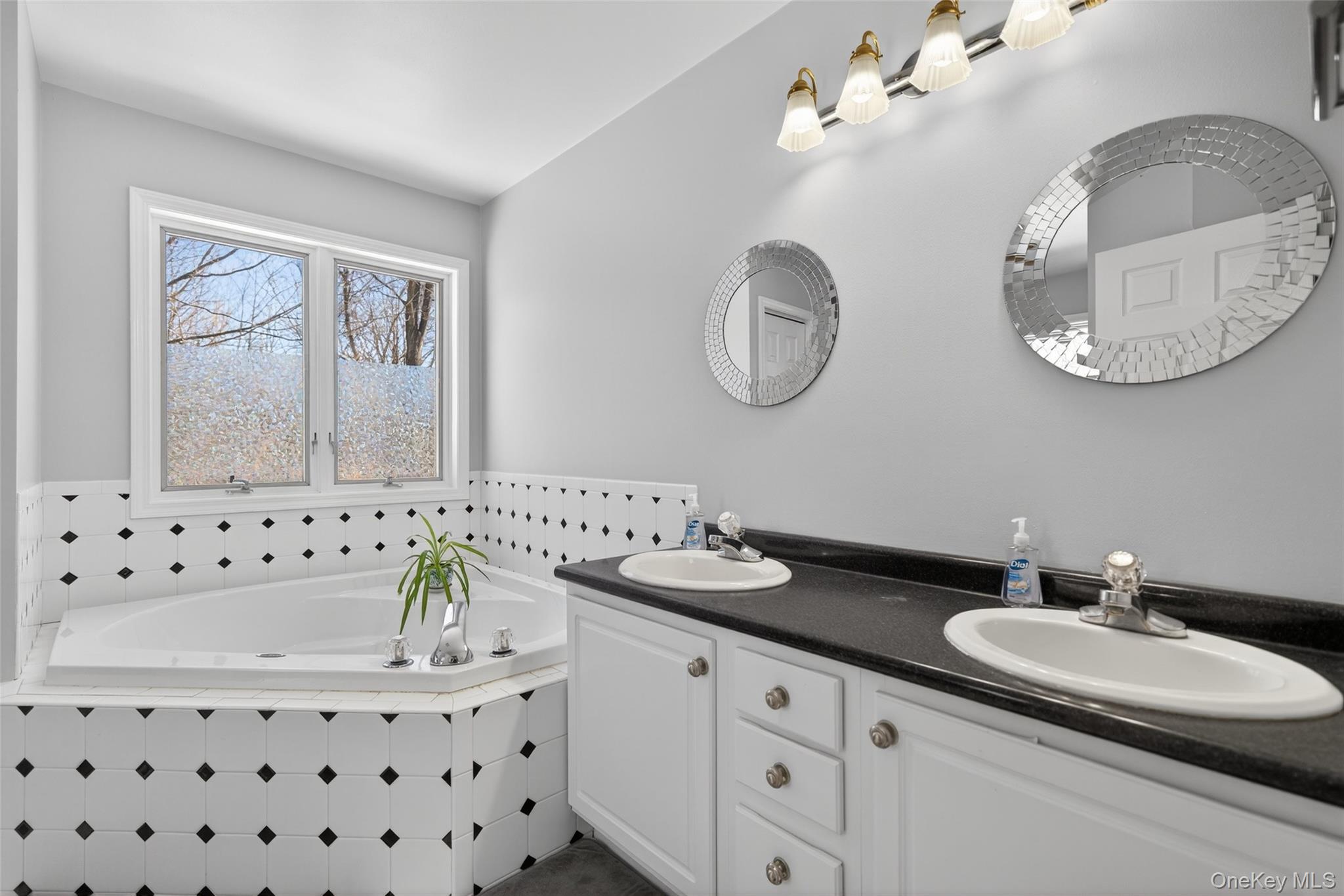 34 Booth Road Chester, NY 10918 - Photo 22 of 42 Full bathroom featuring double vanity and a jetted tub