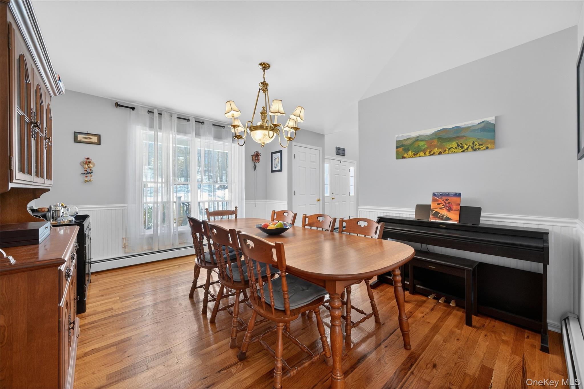 34 Booth Road Chester, NY 10918 - Photo 7 of 42 Dining space featuring wainscoting, chandelier and wood floors