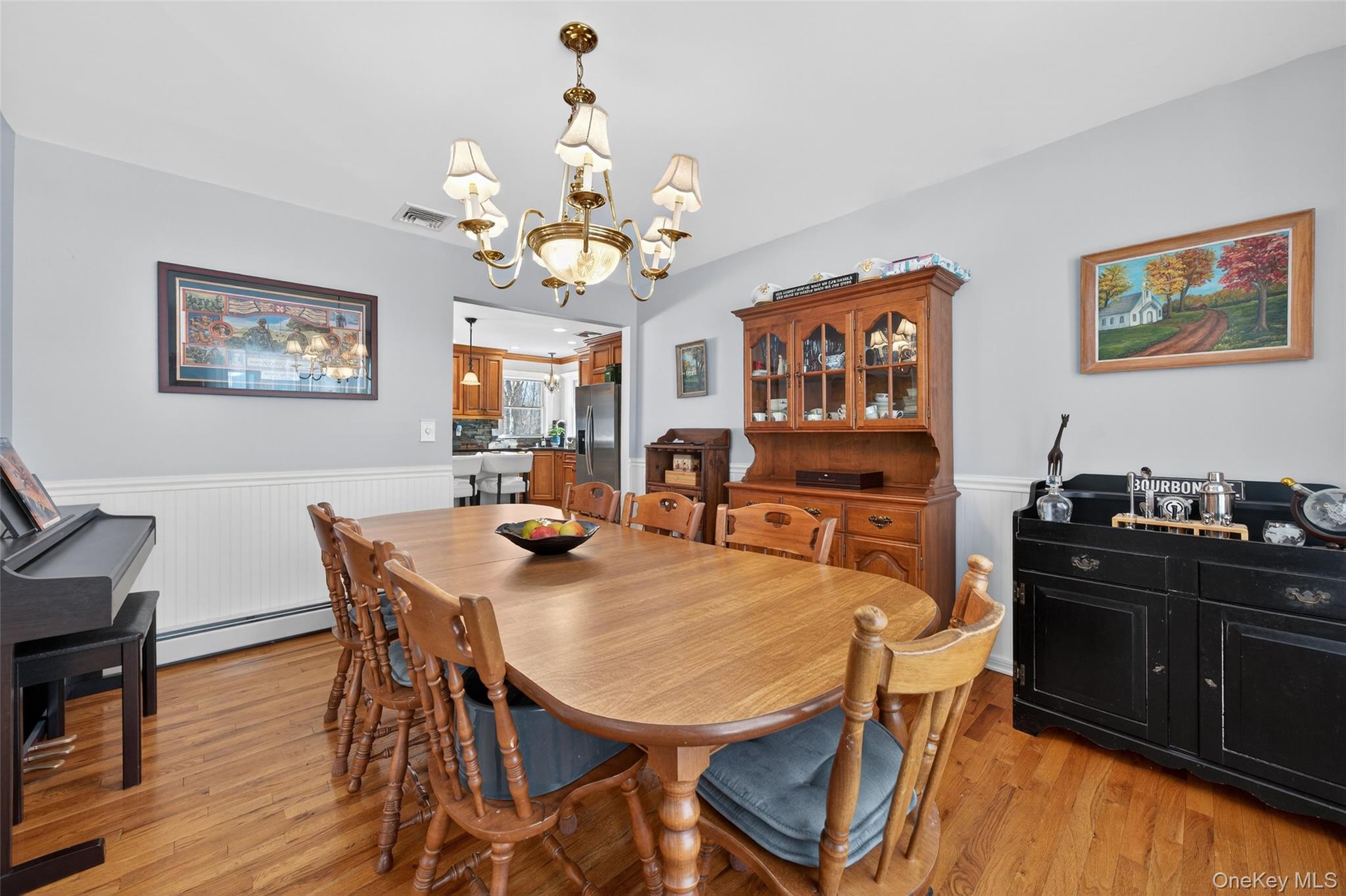 34 Booth Road Chester, NY 10918 - Photo 8 of 42 Dining room featuring wainscoted walls and wood floors