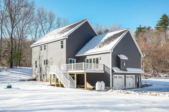 a view of a house with a street