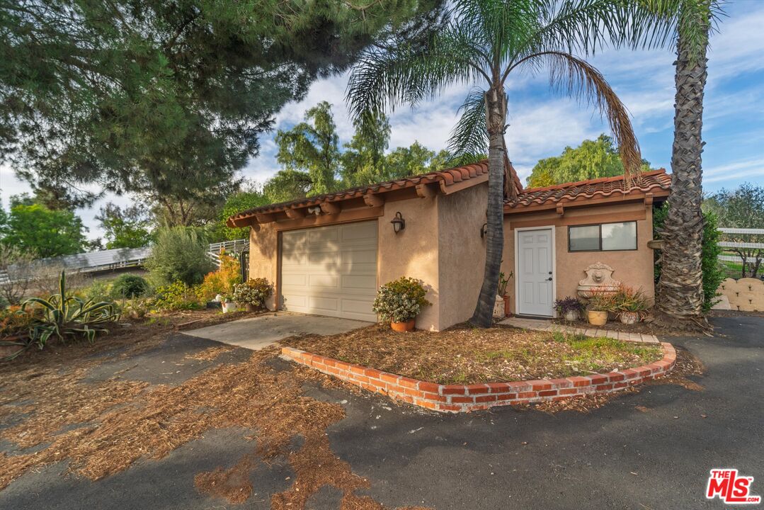 39700 Ave Arizona Temecula, CA 92591 - Photo 11 of 23 a view of a house with a patio