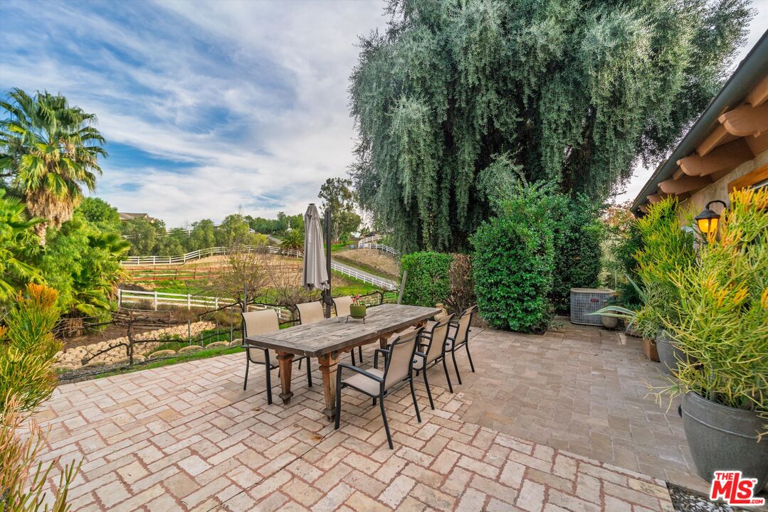 39700 Ave Arizona Temecula, CA 92591 - Photo 12 of 23 a view of a chairs and table in the patio