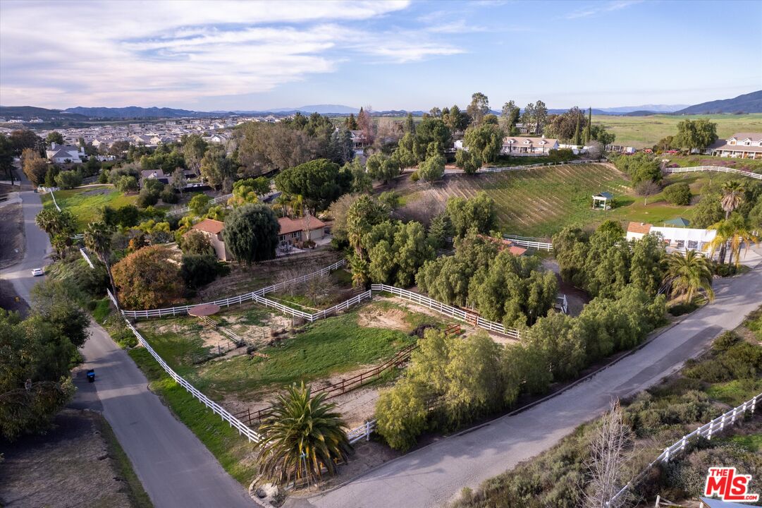39700 Ave Arizona Temecula, CA 92591 - Photo 19 of 23 a view of a garden with mountains in the background
