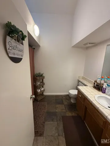 a bathroom with a sink and a toilet