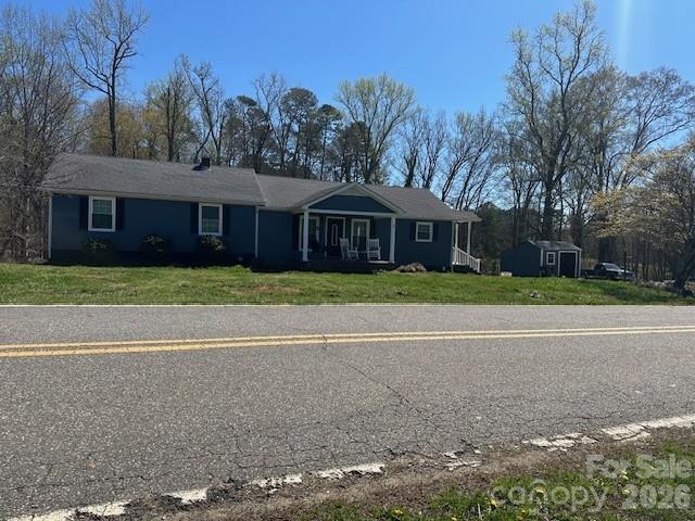 636 Willis Road Dallas, NC 28034 - Photo 1 of 18 a view of a yard in front of a house