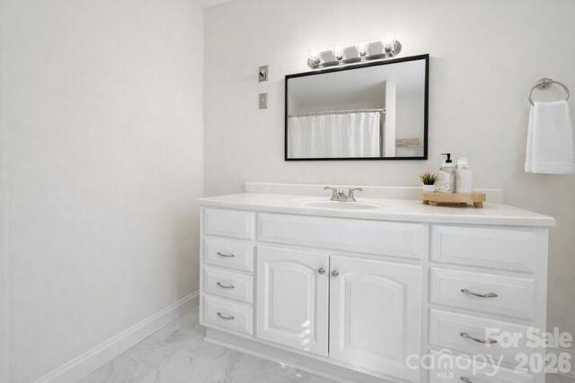 636 Willis Road Dallas, NC 28034 - Photo 15 of 18 a bathroom with a sink vanity and mirror