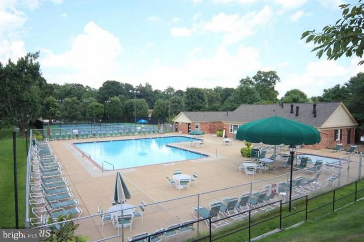 8110 Colony Point Road, Unit K Springfield, VA 22152 - Photo 30 of 30 a view of a swimming pool with a patio