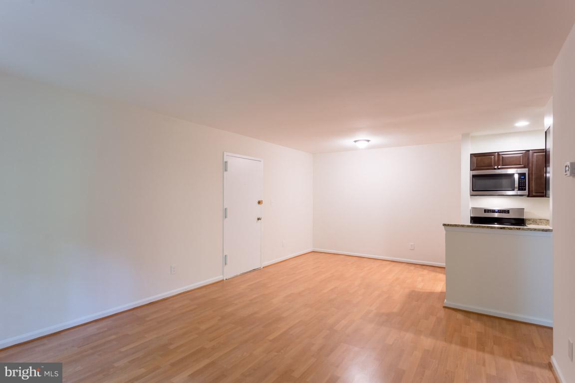 8110 Colony Point Road, Unit K Springfield, VA 22152 - Photo 7 of 30 a view of kitchen with wooden floor