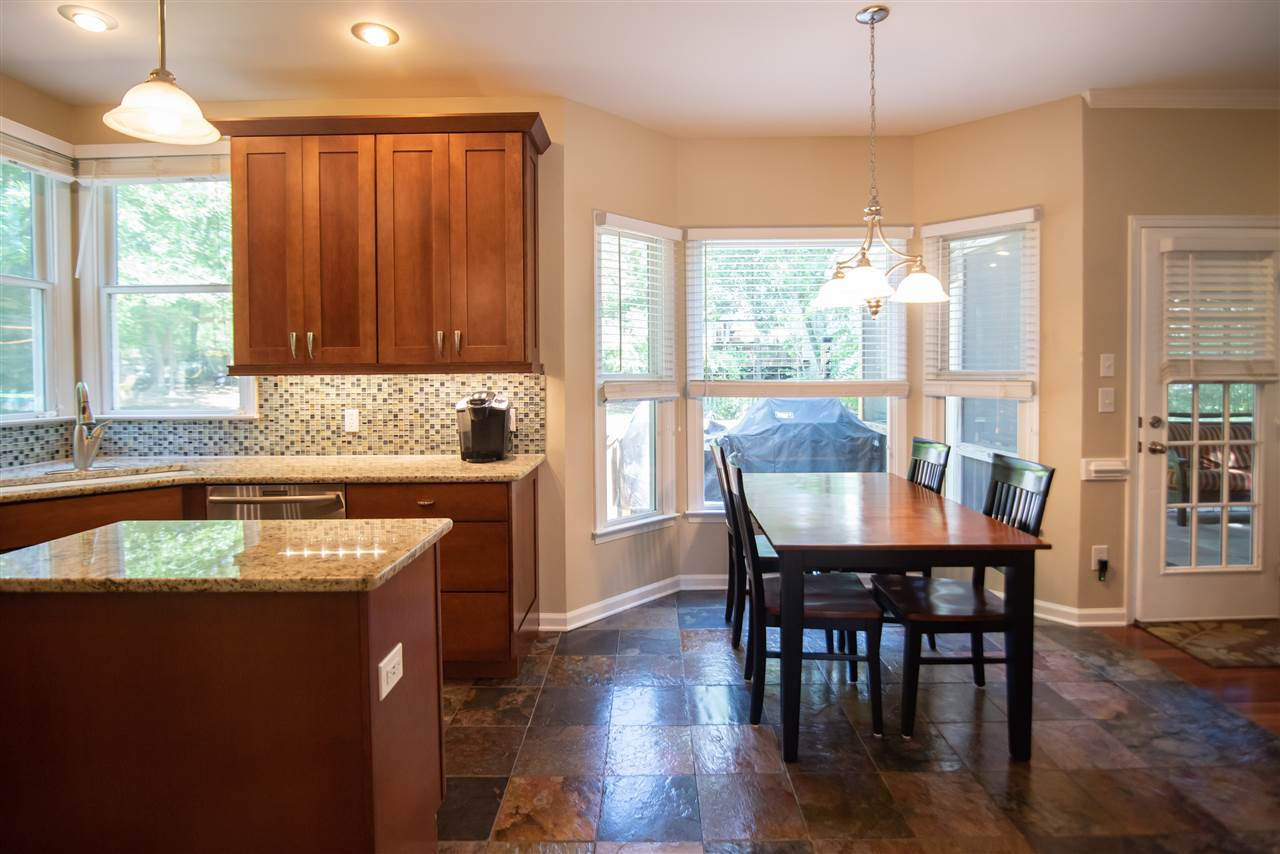 9720 Talman Court Raleigh, NC 27615 - Photo 11 of 30 Breakfast area features a large bay window. Breakfast Area