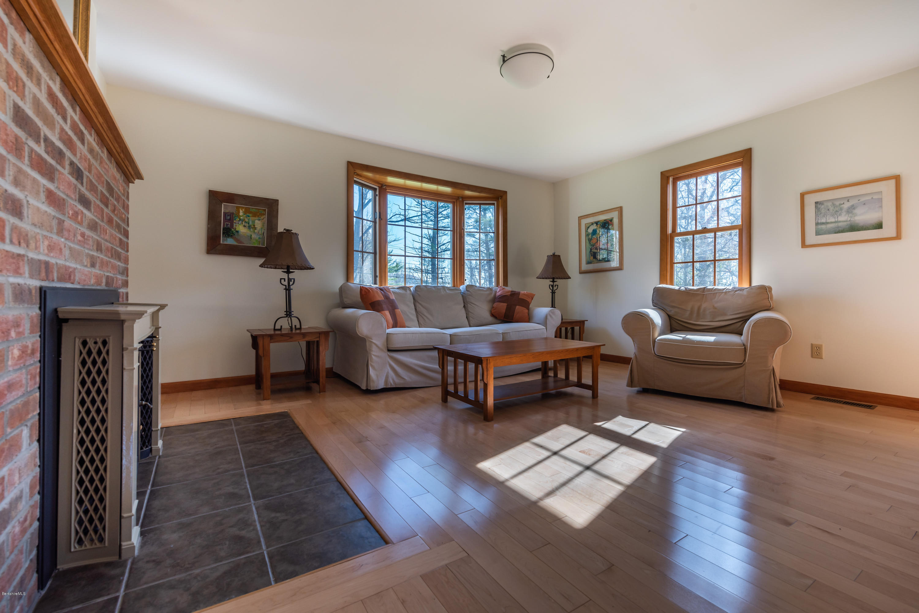 31 Interlaken Road Stockbridge, MA 01266 - Photo 11 of 34 a living room with furniture and a fireplace