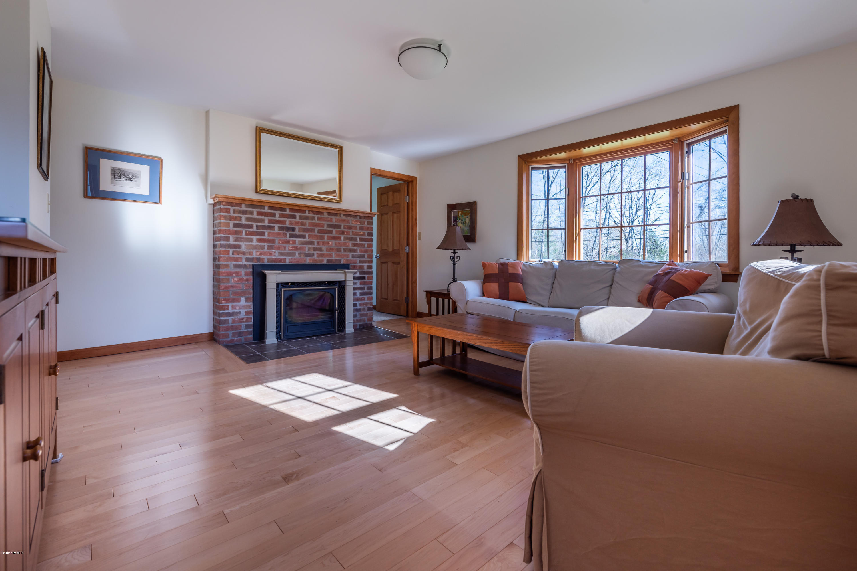 31 Interlaken Road Stockbridge, MA 01266 - Photo 13 of 34 a living room with furniture and a fireplace