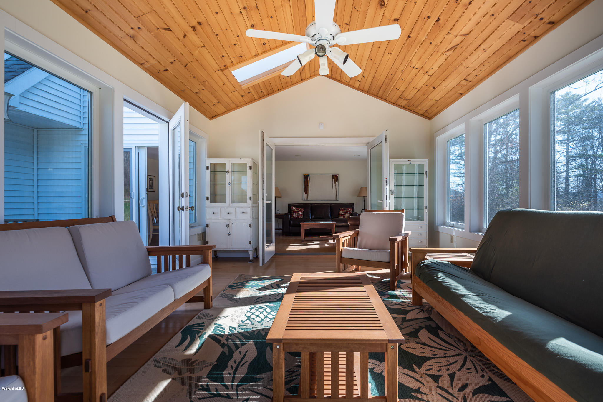 31 Interlaken Road Stockbridge, MA 01266 - Photo 18 of 34 a living room with furniture and a dining table