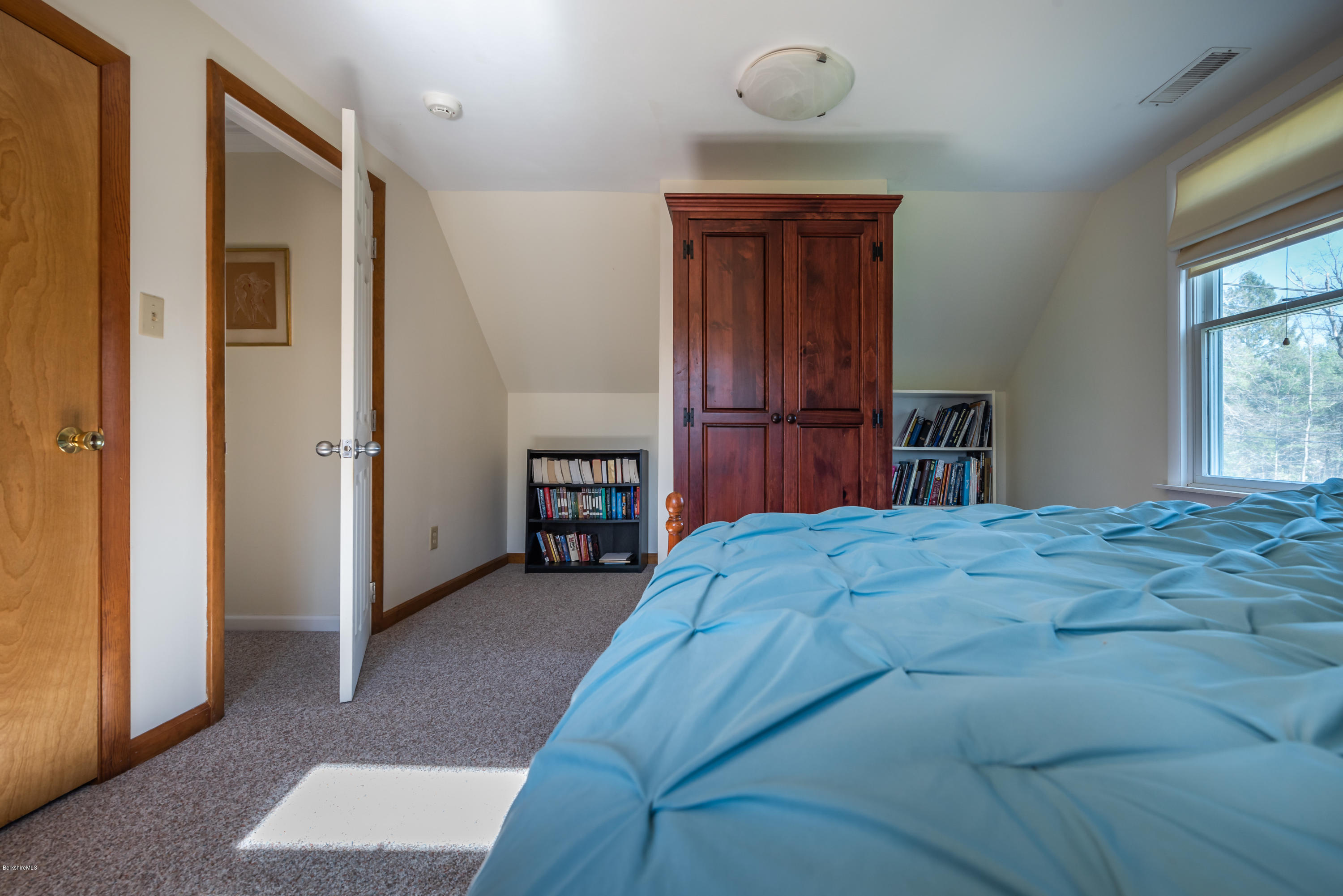 31 Interlaken Road Stockbridge, MA 01266 - Photo 26 of 34 a bedroom with a bed and a closet